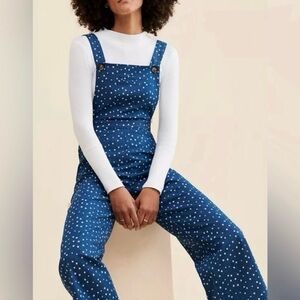 Anthropologie x Saint Geraldine Suggs blue bib overalls with star print.Size L